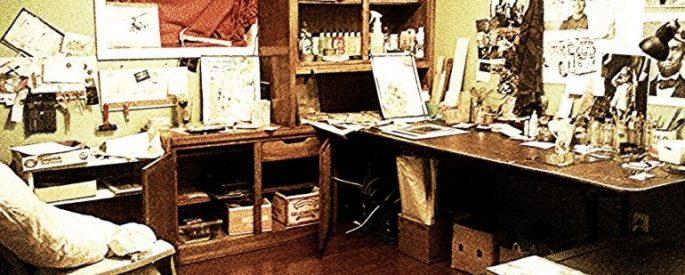 photograph of a cluttered artist's studio