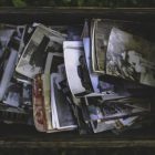 wooden box of vintage photographs