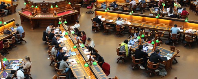 A photo of students studying in a campus library