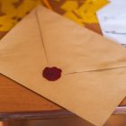 Image of a brown envelope with a red seal