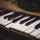 A close-up photo of askew piano keys.