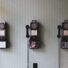Three repeating rotary phones