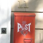 photo of a small mailbox with the label "POST" on the front