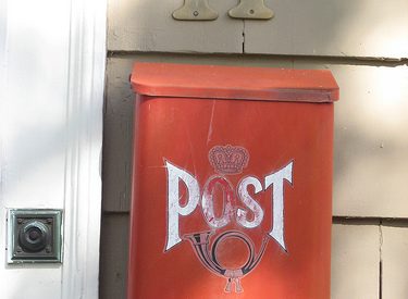 photo of a small mailbox with the label "POST" on the front