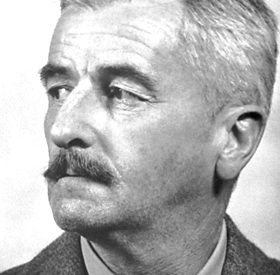 black and white headshot of William Faulkner who looks off into the distance