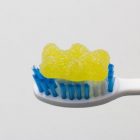 Gummy bear on a toothbrush