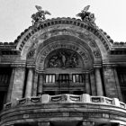 Black and white photo of the arch over the entrance of Bellas Artes in Mexico City