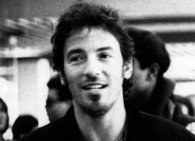 Black and white picture of young Bruce Springsteen
