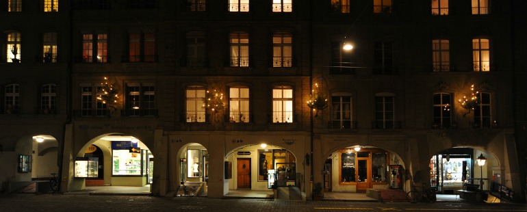 street scene and apartments at night 
