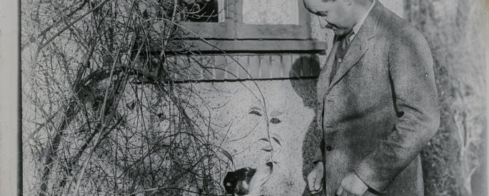 man and dog in vintage photo