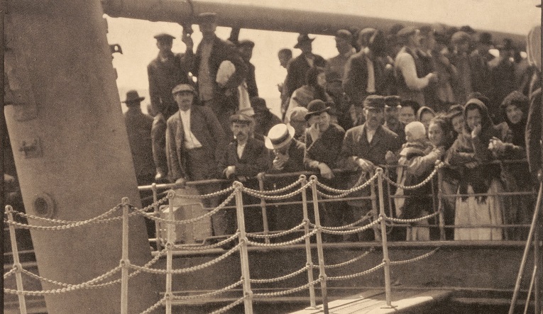 Old photograph of  people on a boat.