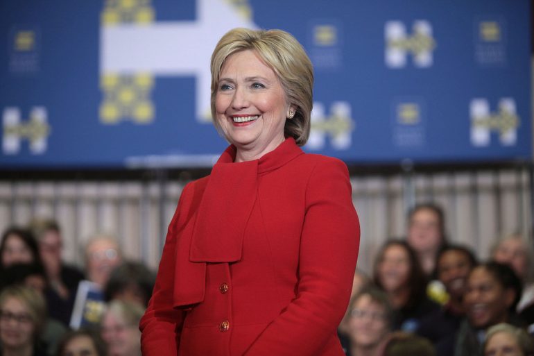 Hillary Clinton in a red suit.