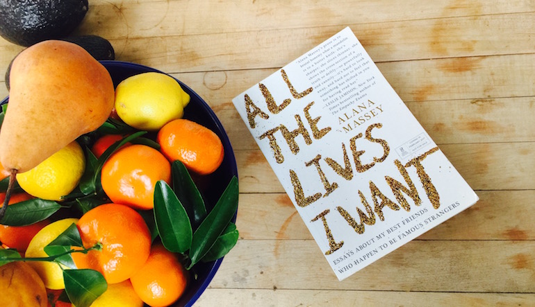 "All the Lives I Want" next to a bowl of fruit.