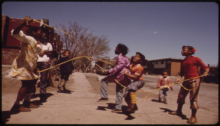 Children playing jumprope.