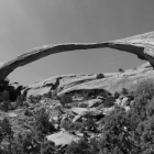 arched rock formation at Arches National Park, in black and white