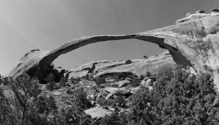 arched rock formation at Arches National Park, in black and white