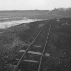 black and white photograph of an old railroad track