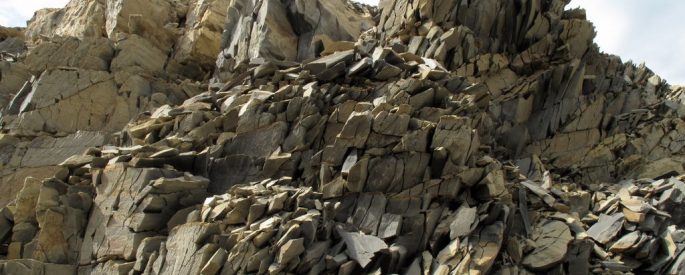 Photograph of a large jagged rock formation