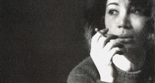 black and white portrait of Forugh Farrokhzad smoking a cigarette